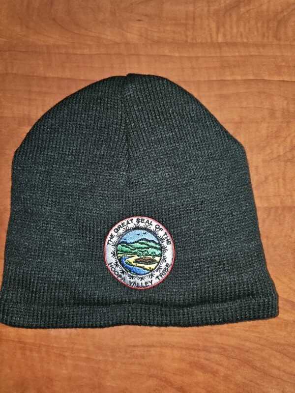 black beanie with tribal seal