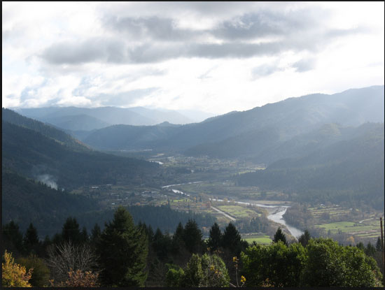 A beautiful view across a valley on a cloudy day.